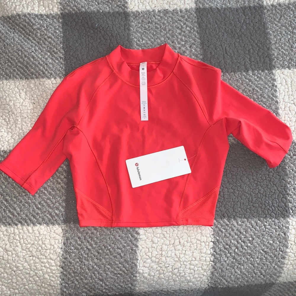 LULULEMON EVERLUX AND MESH CROPPED SHORT SLEEVE TOP SIZE 4 coral